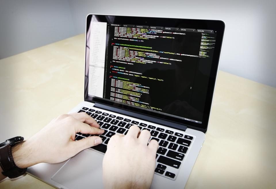 Illustrative photograph of coding Business